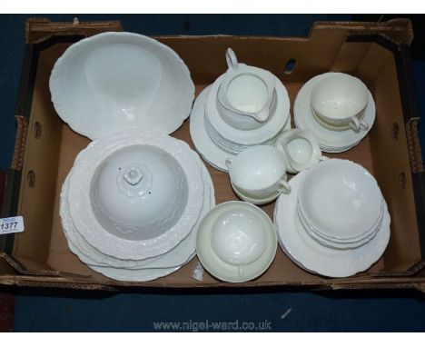A good quantity of white Coalport china with embossed garland design, jugs, saucers, cups etc, (some seconds)