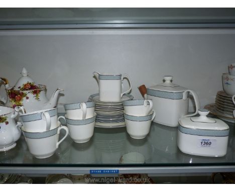 A Royal Doulton 'Etude' Teaset for six with teapot, milk jug, sugar bowl and bread and butter plate.