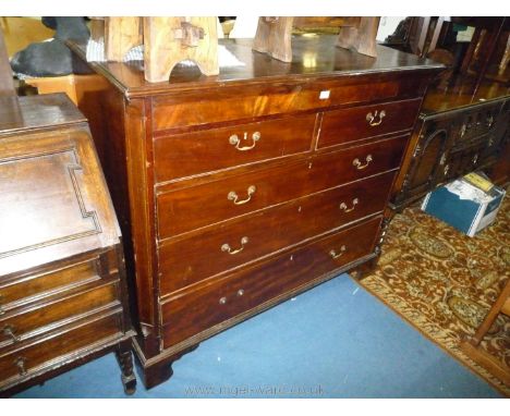 A circa 1900 Mahogany Chest of three long and two short Drawers having drop brass swan-neck handles and standing on bracket f
