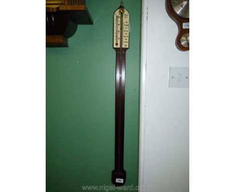 A Mahogany cased Stick Barometer, having maker's name ''O. Comitti and Son', London''. 36'' long.