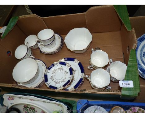 Two part tea-sets, one being a Heathcote china Sheraton pattern to include five cups, six saucers, four tea plates and a slop