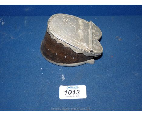 A trinket box made from a Donkey hoof, lined in velvet and with white metal hinged lid, engraved Syria 1918.