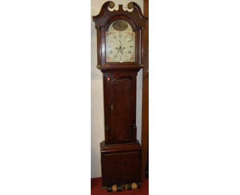 A circa 1800 oak and mahogany crossbanded provincial longcase clock, having a painted arch dial signed R. Radford & Sons, Lee