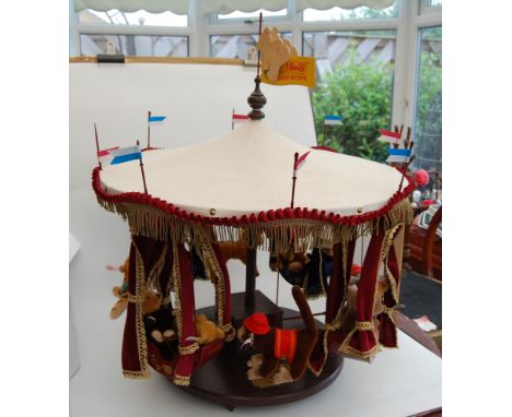 A Steiff 'Millennium Carousel', based on an original created by Margarete Steiff from circa 1880, as eight bears on revolving