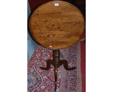 An early 19th century provincial elm circular tilt-top pedestal tripod table, dia. 53.5cm    Condition Report / Extra Informa