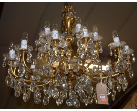 A French gilt metal multi light hanging electrolier with cut crystal glass drops, approx drop 70cm