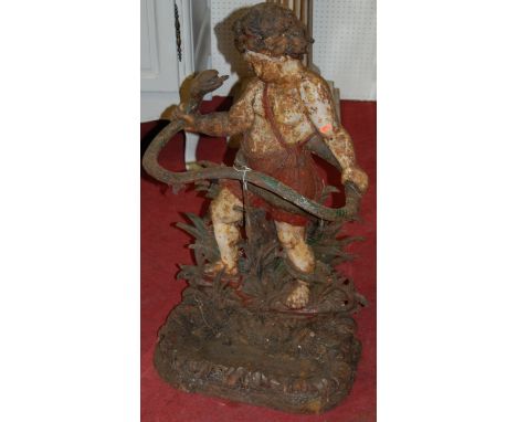 A Coalbrookdale design cast iron stick stand, in the form of a Hercules as a young boy strangling a snake