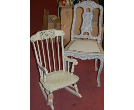 A child's floral painted stick back rocking elbow chair, together with a French limed provincial single dining chair (2)