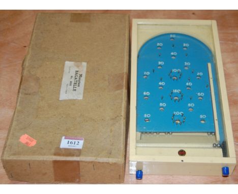 A boxed Chad Valley miniature Bagatelle, No.9332, in original buff coloured box 