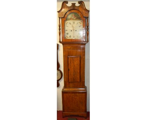 A circa 1800 oak and mahogany cross banded longcase clock, having a painted arch dial with pendulum and single weight