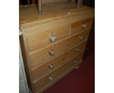 A Victorian light oak and pine chest of two short over three long graduated drawers on turned bun supports, width 94cm