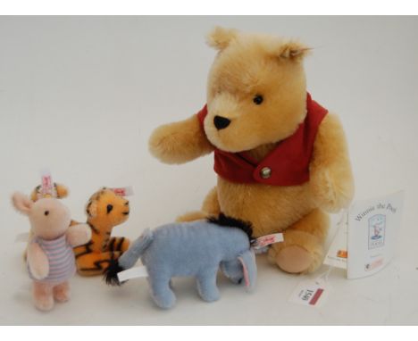 A Steiff Winnie the Pooh miniature teddy-bear set, No.354205, limited edition No.5754/10000, boxed (box poor)