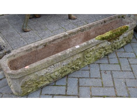 A reconstituted stone long garden trough, length 145cm