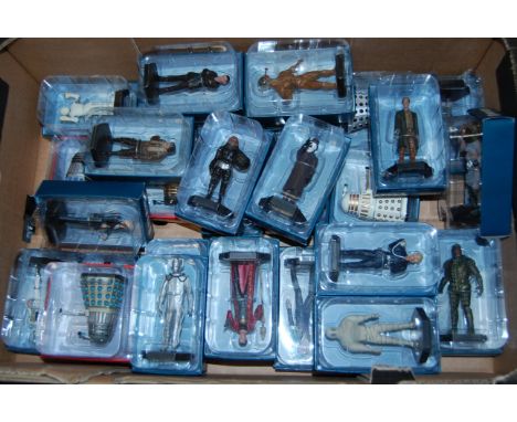 A collection of Doctor Who by Eagle Moss boxed and cased action figures, to include; Robot Mummy, Rassilon, Cyberman etc 