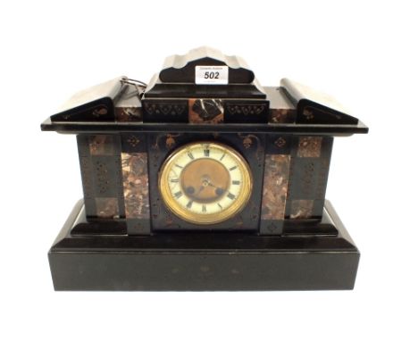 A black and rouge marble mantel clock 