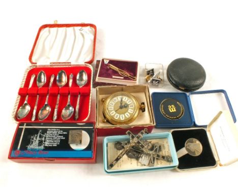 A piece of timber from the "Mary Rose" in perspex, a travelling clock and other items