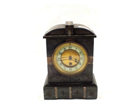 A black slate mantel clock