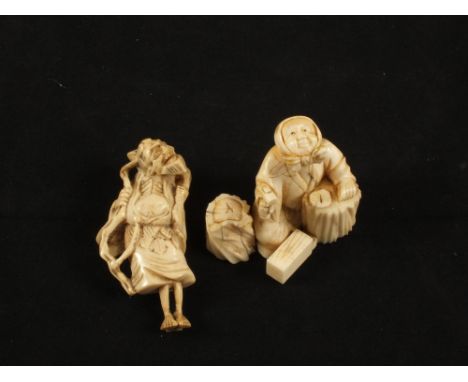 Japanese Ivory okimonos of a seated woman with hammer and a netsuke of a man carrying a toad