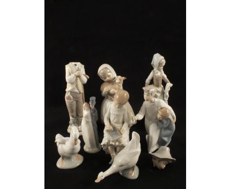 Seven Nao and one Lladro figures (three damaged)