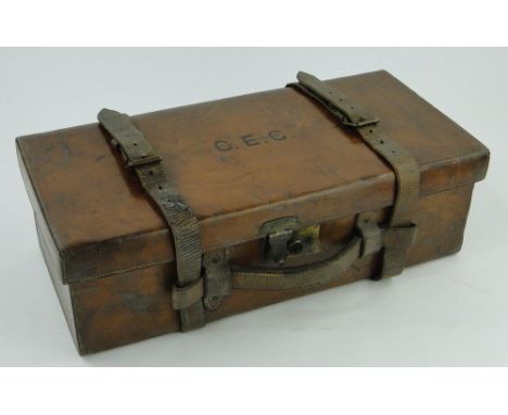 Antique leather shotgun cartridge case
with sectioned interior by Army & Navy C S L Westminster, length 21".