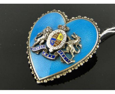 A sterling silver and enamel heart shaped brooch,
with enamelled Royal crest mount, height 45mm.