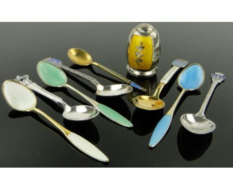 Quantity of silver and enamel souvenir spoons,
and a Danish sterling silver and enamel pepperette.