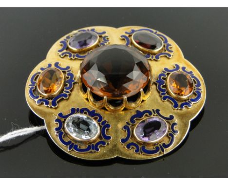 A Scottish unmarked gold and enamel circular brooch,
set with multi-colour gemstones, 55mm across.