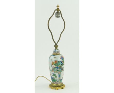 Chinese Famille Vert table lamp
with gilt metal mounts, 22" overall.