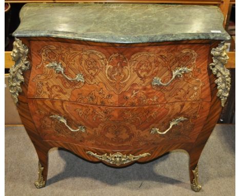 A continental Kingwood commode,
having a shaped marble top with crossbanded 2 drawers under, allover inlaid decoration and or