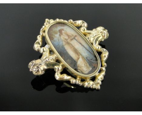An Antique miniature watercolour, portrait of a lady in ornate unmarked gold frame,
height 35mm.