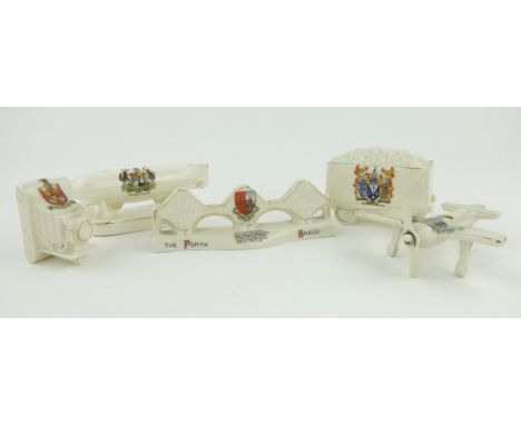 Carlton china crestedware aeroplane,
length 5.25", a coal wagon, camera, etc, (5).