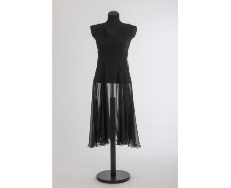 AbendkleidJil Sander, Hamburg Seide, transparent, schwarz, ärmellos, weiter Rock. Gr. 38.