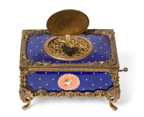 A Fine Gilt-Metal And Viennese Enamel-Panel Cased Singing Bird Box, Circa 1920, with going-barrel three-pillar movement most 