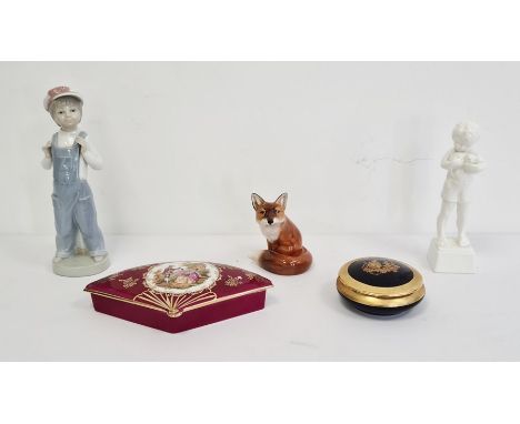 Royal Doulton model of a fox, a Lladro figure of a boy wearing a cap and dressed in blue dungarees, a white glazed figure of 