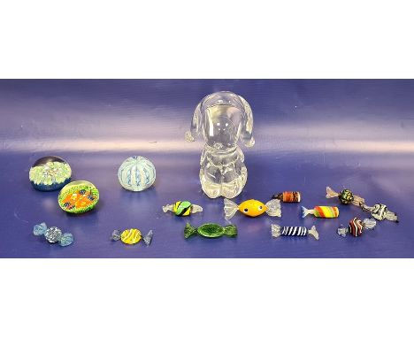 Murano glass paperweight, two other paperweights, a collection of glass-coloured sweets and a model paperweight in the form o