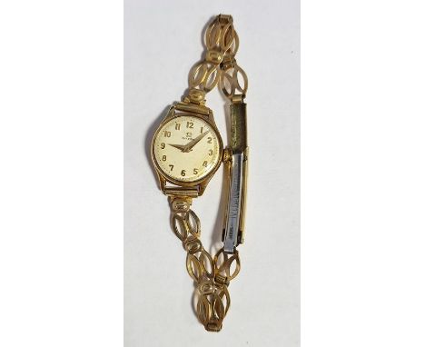 Lady's Omega gold-coloured metal wristwatch with Arabic numerals, button winding and the rolled gold fancy chain link bracele