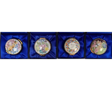 Four Kingsley enamel patch boxes, circular and floral decorated, all boxed 