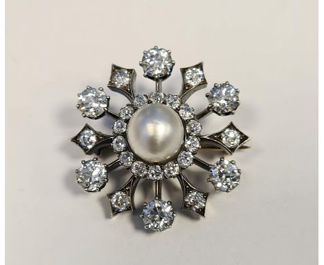 Early 20th century pearl and diamond target brooch, the central pearl (approx. 9mm diameter, untested) surrounded by 14 old-c