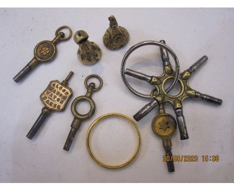 22ct gold wedding ring, 4.2oz approx, two gold-plated seals and quantity watch keysCondition ReportNeither of the seals have 