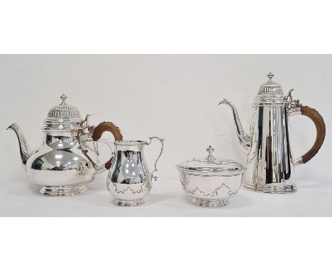 Twentieth century four-piece silver tea service, comprising lidded sugar pot, teapot, cream jug and a coffee pot, London 1908