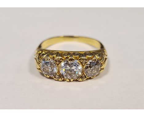 Victorian gold-coloured graduated diamond three-stone ring, with three old brilliant-cut diamonds (estimated weights 0.6ct VS