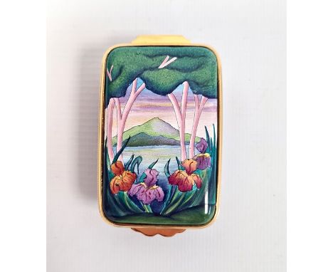 Moorcroft enamel patch box, rectangular and decorated with irises in lakeside landscape, initialled 'PW' to base, 6cm wide