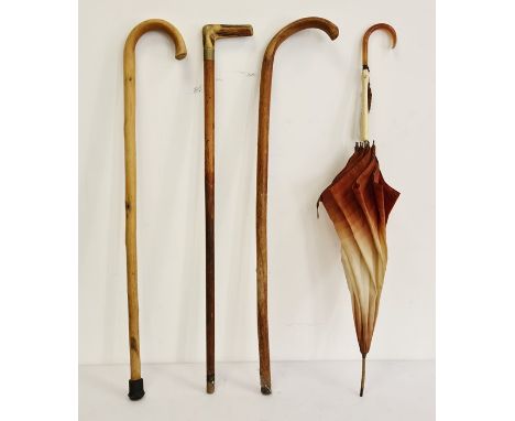 Horn-handled walking stick, 2 others and an umbrella (4)