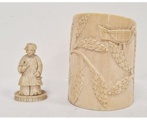 Early 20th century Chinese carved ivory chess piece figure, 6.5cm and an early 20th century African carved ivory bangle&nbsp;