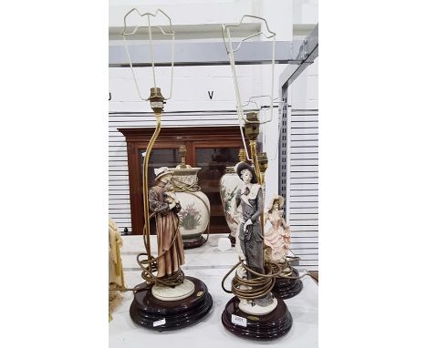 Three table lamps with ceramic bases modelled as an elegant lady, a lady holding a puppy and another with a swirling skirt wi