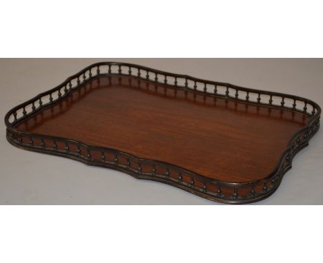 A CHIPPENDALE DESIGN MAHOGANY TRAY with pierced gallery. 2ft long.