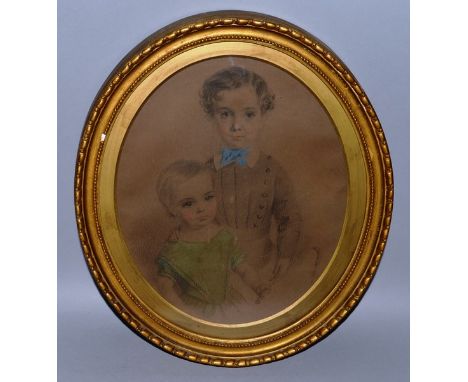 A VICTORIAN OVAL PORTRAIT OF A YOUNG BOY AND GIRL.  14ins x 9ins, in an oval gilt frame.