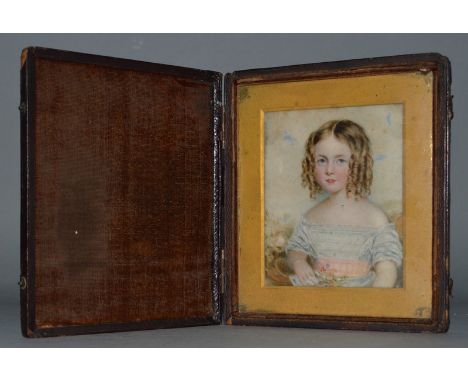 A VICTORIAN PORTRAIT OF A YOUNG GIRL, half length, her hair in ringlets.  3ins x 2.5ins, in a folding leather case.