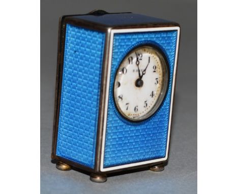 A VERY GOOD SILVER AND BLUE ENAMEL MINIATURE CLOCK, stamped .0935 Geneva, Switzerland, eight day.  4cms high.