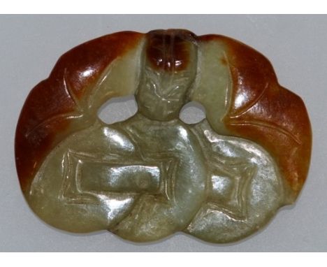 A CARVED MUTTON FAT JADE "BATSWING".